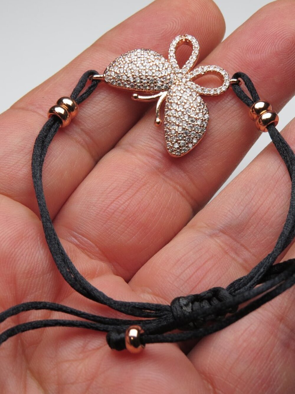 Lady's Butterfly cz 18k plated Black string Bracelet
